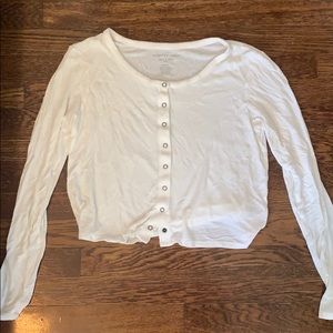White buttoned long sleeve shirt